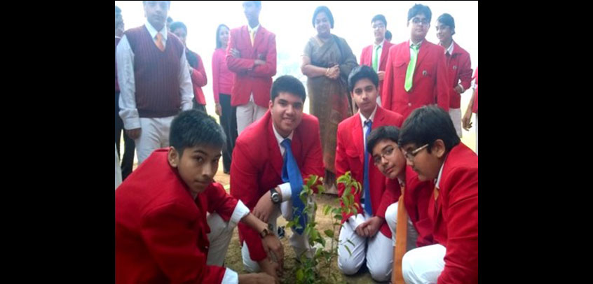 the image shows the students of senior wing planting trees,best private cbse school in delhi
